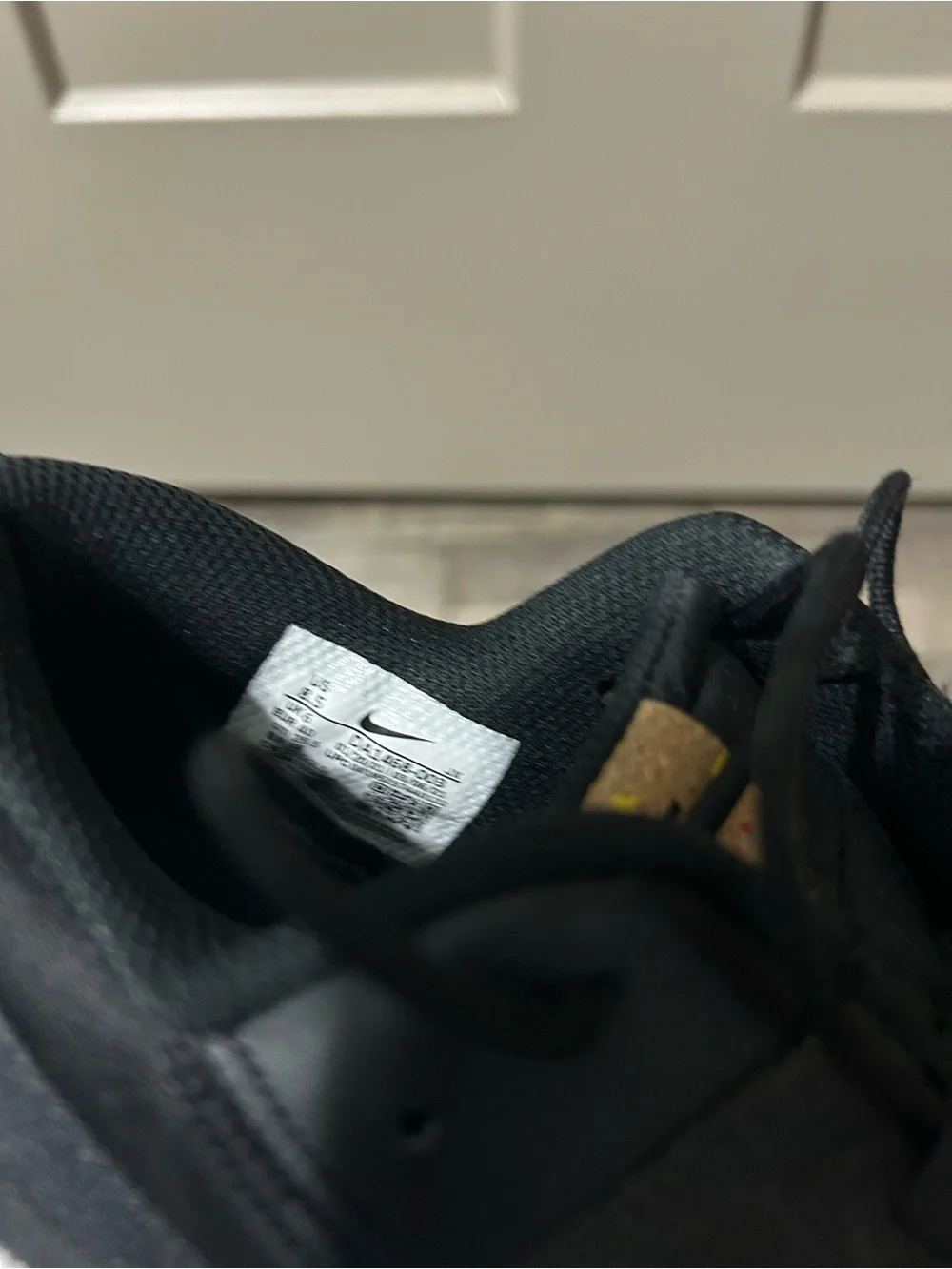 black and white Nike Crater Remixa sneakers speckled soles